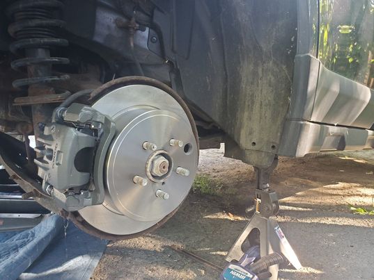 Freshly replaced brakes on the Subaru.