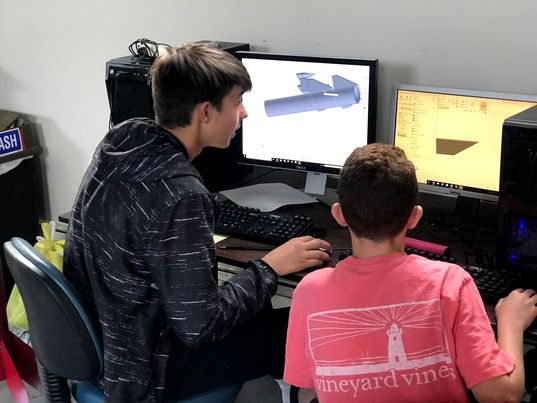 Training some noobs on SOLIDWORKS.